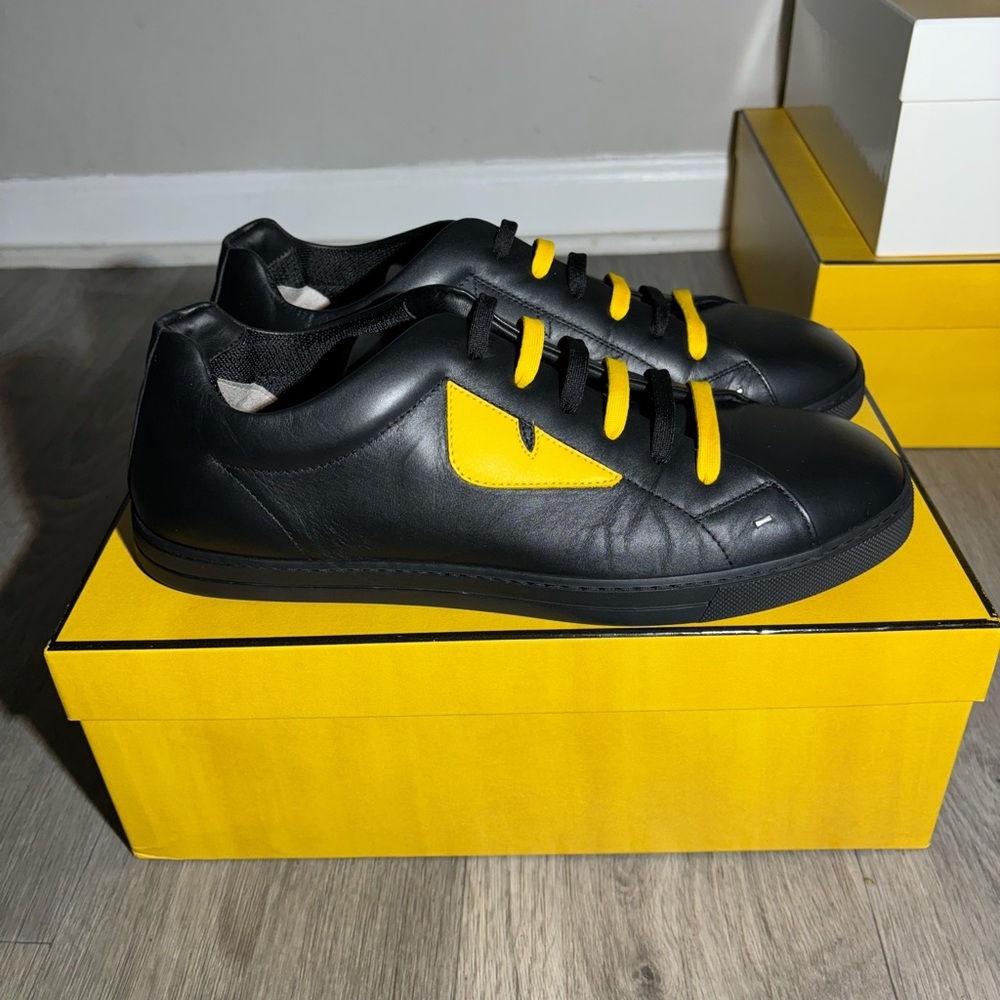 Black and yellow Fendi sneakers
